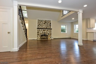 Lake Mohawk living, reimagined & transformed from approximately - photo 9