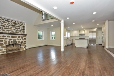 Lake Mohawk living, reimagined & transformed from approximately - photo 10