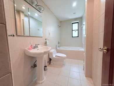 Welcome to this bright and inviting two-bedroom co-op apartment - photo 12