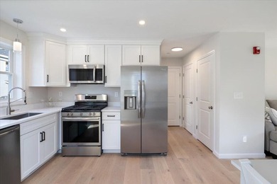 Like-new luxury 2-bedroom, 2.5-bath end-unit townhome in an - photo 12