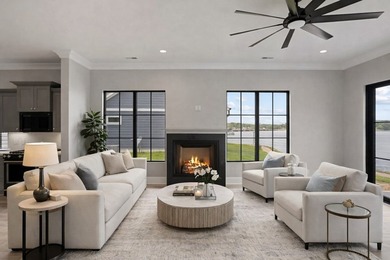 Experience panoramic lake living at its finest. This