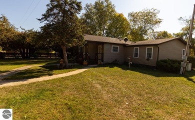Lake Home For Sale in Weidman, Michigan