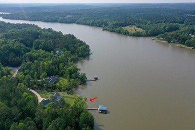 Positioned on a spectacular 2.4 acre lot with 267-foot lakefront - photo 6