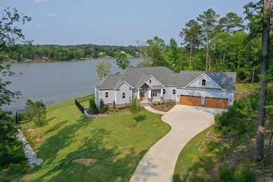 Positioned on a spectacular 2.4 acre lot with 267-foot lakefront - photo 7