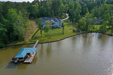 Positioned on a spectacular 2.4 acre lot with 267-foot lakefront - photo 8