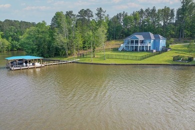 Positioned on a spectacular 2.4 acre lot with 267-foot lakefront - photo 9