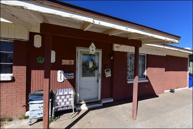 This well-maintained three-bedroom, one and three-quarter bath