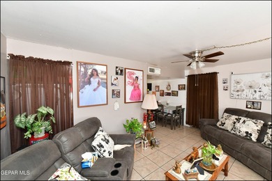 This well-maintained three-bedroom, one and three-quarter bath