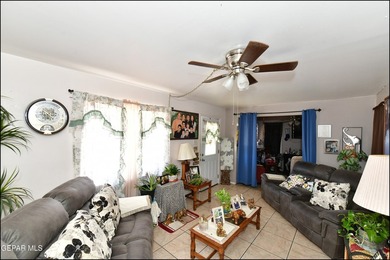 This well-maintained three-bedroom, one and three-quarter bath