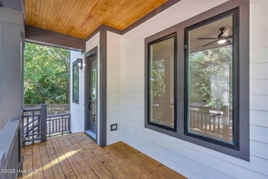 Experience elevated coastal living at 1624 Sunrise Lane in