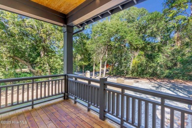 Experience elevated coastal living at 1624 Sunrise Lane in