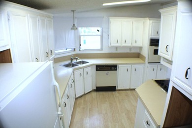 Enjoy the lake-view home on a corner lot and airy interior with - photo 13