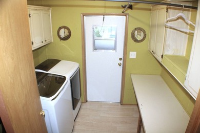 Enjoy the lake-view home on a corner lot and airy interior with - photo 17