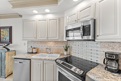 Experience easy coastal living in this beautifully updated - photo 19