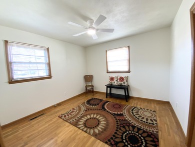 Location, location, location! This all one level home with 4