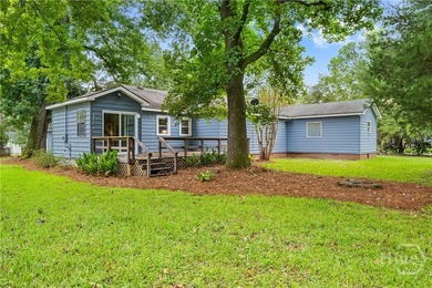 Nestled in the heart of Isle of Hope on large corner lot, this - photo 3