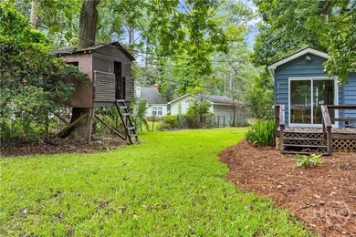 Nestled in the heart of Isle of Hope on large corner lot, this - photo 4