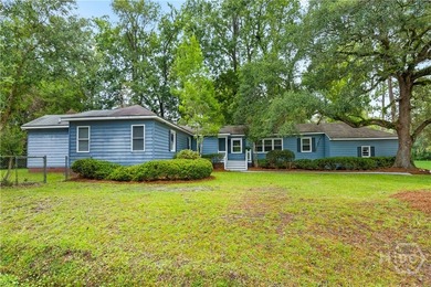 Nestled in the heart of Isle of Hope on large corner lot, this - photo 5