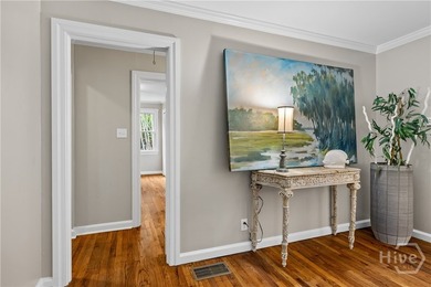 Nestled in the heart of Isle of Hope on large corner lot, this - photo 9