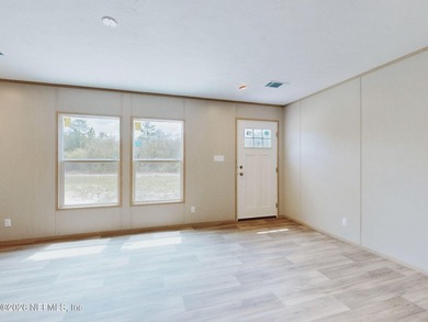 Just Listed! Discover this beautifully designed 5-bedroom - photo 2