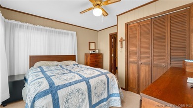 Don't miss this wonderful lake home located at the 8-mile marker - photo 11