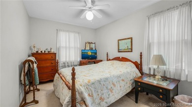 Don't miss this wonderful lake home located at the 8-mile marker - photo 12