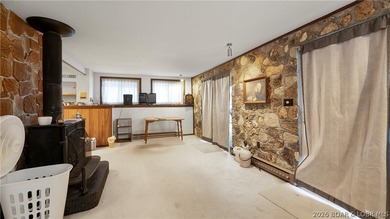 Don't miss this wonderful lake home located at the 8-mile marker - photo 17