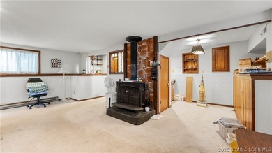 Don't miss this wonderful lake home located at the 8-mile marker - photo 19