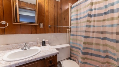 Don't miss this wonderful lake home located at the 8-mile marker - photo 20