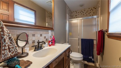Don't miss this wonderful lake home located at the 8-mile marker - photo 22