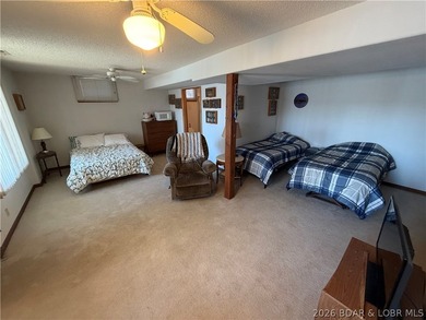Don't miss this wonderful lake home located at the 8-mile marker - photo 23