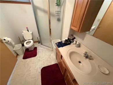 Don't miss this wonderful lake home located at the 8-mile marker - photo 26