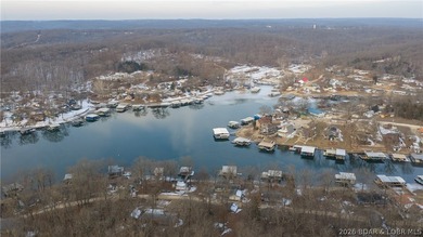 Don't miss this wonderful lake home located at the 8-mile marker - photo 40