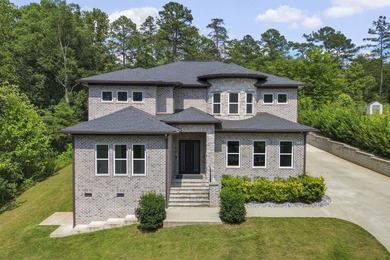 This stunning all-brick home sits on .71 acres and offers 3,250 - photo 1