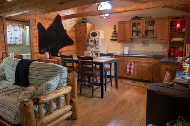 Tucked among the pines of Canada Creek Ranch, a hunting and - photo 2