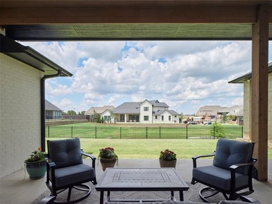 A true stunner in Lakes at Annecy! This single-story home by - photo 2