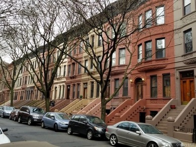 Brick Townhouse on one of Harlem's most beautiful tree-lined - photo 1