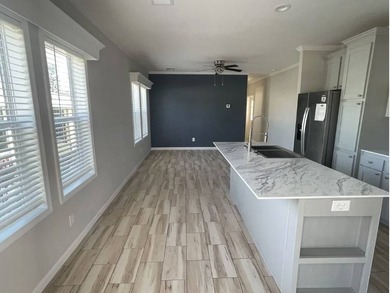 Welcome to this beautiful brand-new 2024 home located in the - photo 3
