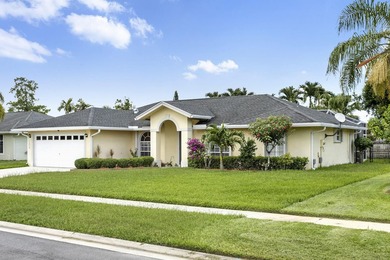 Nestled on a quiet street, this spacious CBS home is designed - photo 1