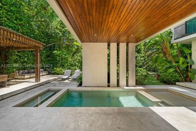 Nestled in the prestigious Ponce-Davis neighborhood, one of - photo 2