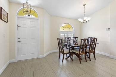 Nestled on a quiet street, this spacious CBS home is designed - photo 2