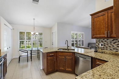 Nestled on a quiet street, this spacious CBS home is designed - photo 5