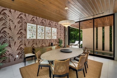 Nestled in the prestigious Ponce-Davis neighborhood, one of - photo 7