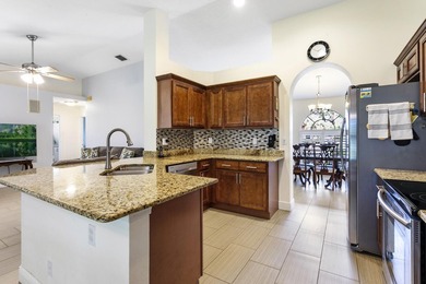 Nestled on a quiet street, this spacious CBS home is designed - photo 7