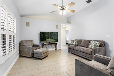 Nestled on a quiet street, this spacious CBS home is designed - photo 8