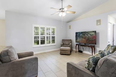 Nestled on a quiet street, this spacious CBS home is designed - photo 9