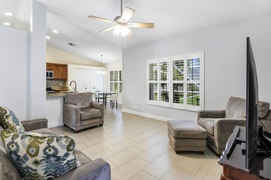 Nestled on a quiet street, this spacious CBS home is designed - photo 10