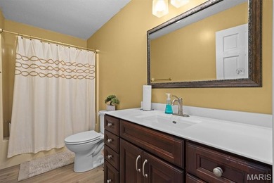 Calling all golf enthusiasts! This handsome two-story - photo 22