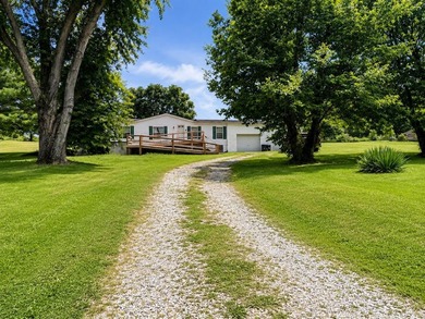 Spacious One-Level Living on a Large Level Lot in Sparta! - photo 1