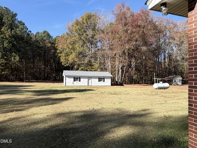 FOR COMP. 3-bedroom, 2-full-bath, one-story brick ranch with